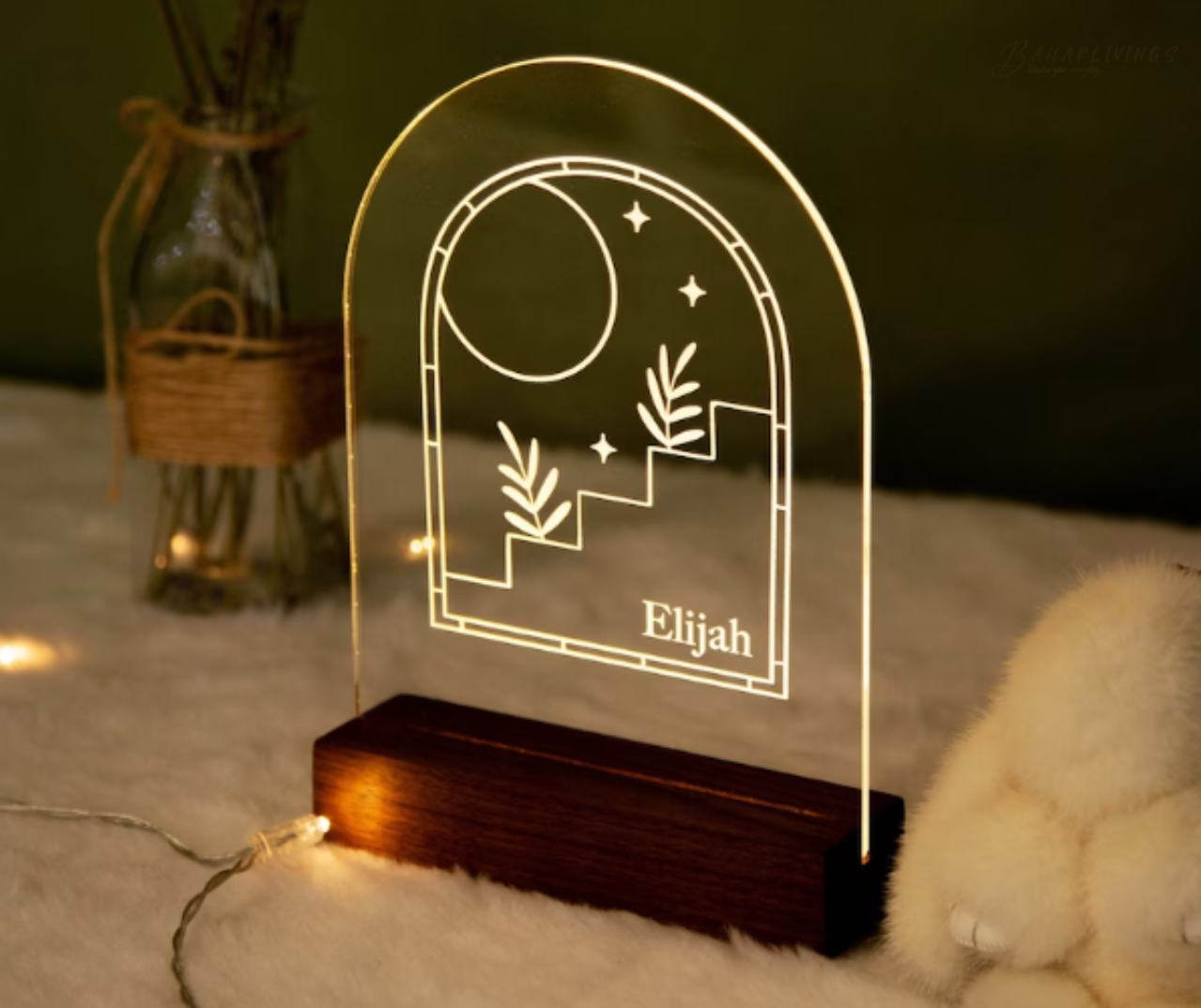 Personalized night light with wooden base and moon and star design.
