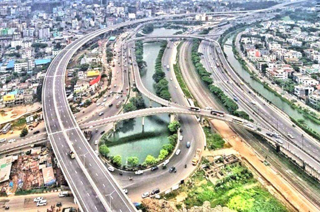 Modern urban life in Dhaka with aerial view of city highways